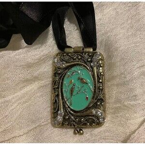 Square Brass Antiquated Design Magnetized Locket with Black Ribbon.